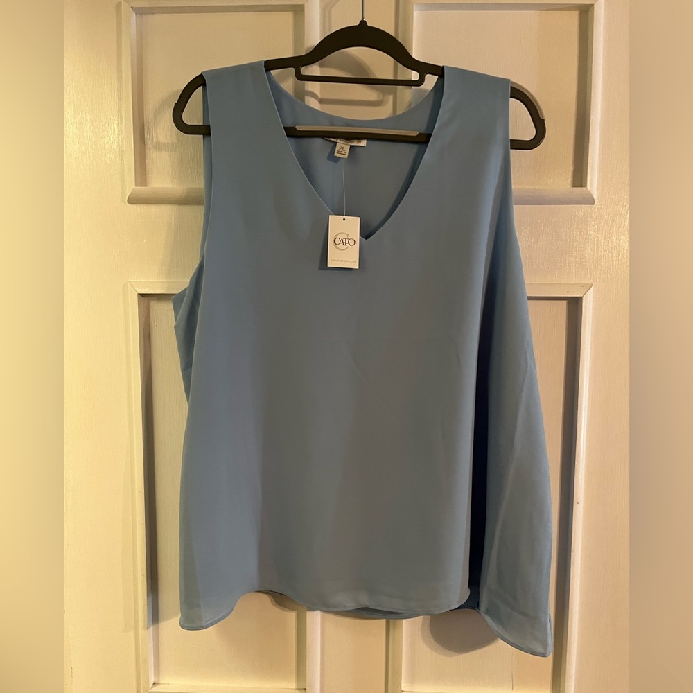 Light Blue Blouse with Flowing Design